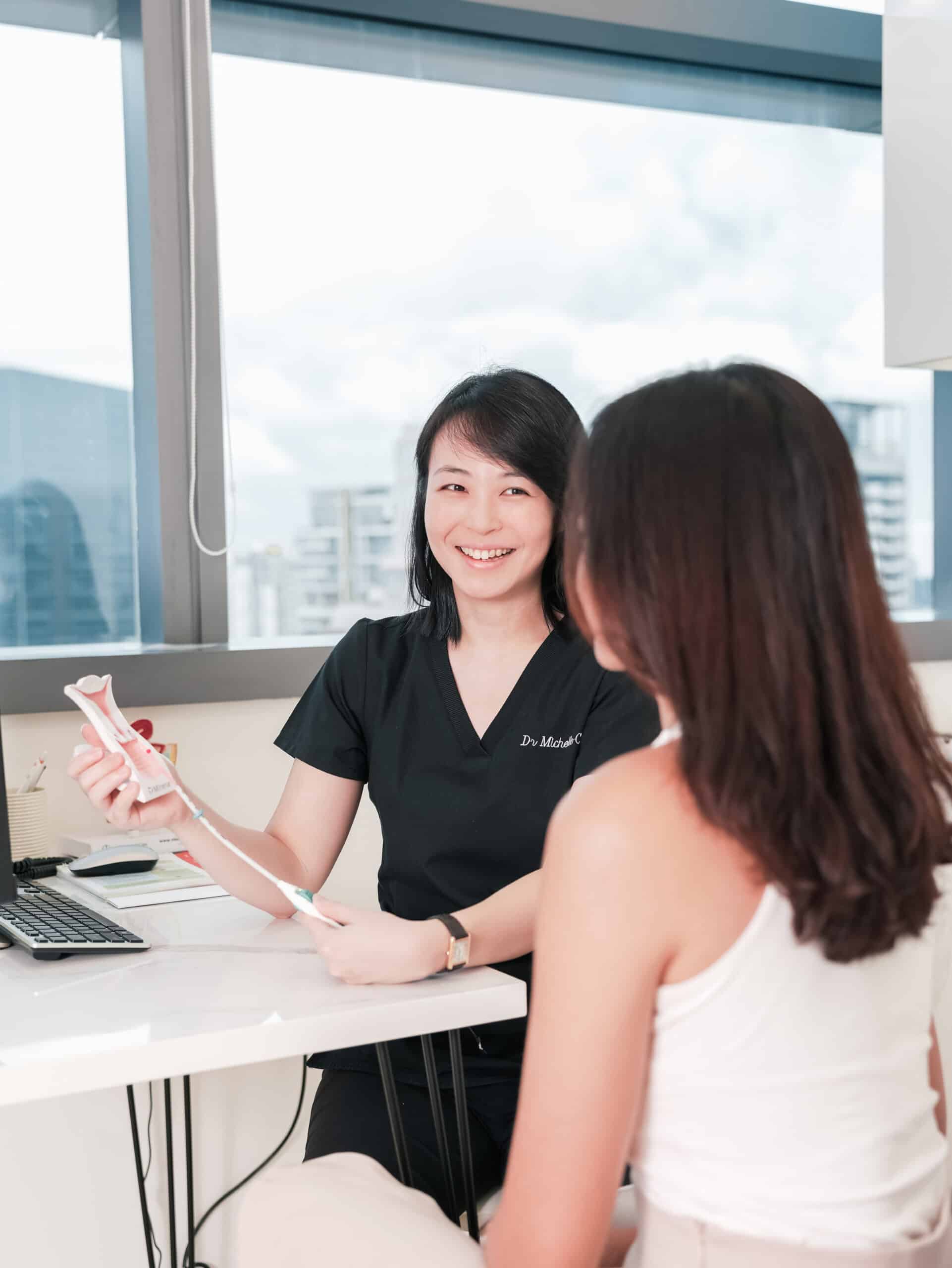 Dr. Michelle Chia during a consultation with patient